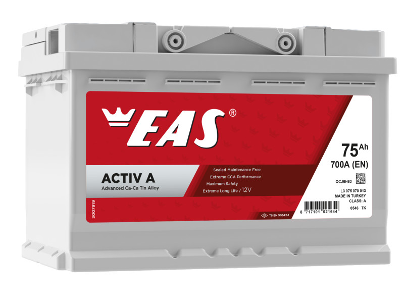 Desk with leather desk pad, walnut desk organizer, wireless keyboard and mouse, and porcelain mug.